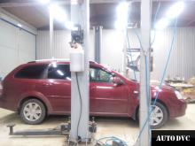 Installing a set of spacers to increase the ground clearance Chevrolet Lacett Lift Kits (leveling kits and coil spacer\strut spacer)
