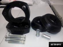 Installing a set of spacers to increase the ground clearance Chevrolet Lacett Lift Kits (leveling kits and coil spacer\strut spacer)