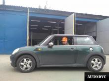 Installing a set of spacers to increase the ground clearance Mini Cooper MINI Hatch II Lift Kits (leveling kits and coil spacer\strut spacer)
