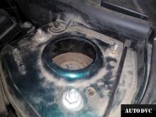 Installing a set of spacers to increase the ground clearance Mini Cooper MINI Hatch II Lift Kits (leveling kits and coil spacer\strut spacer)