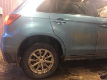 Installing a set of spacers to increase the ground clearance Mitsubishi ASX Lift Kits (leveling kits and coil spring spacer\strut spacer)