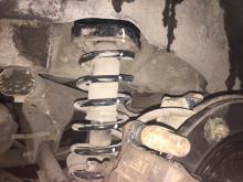 Installing a set of spacers to increase the ground clearance Mitsubishi ASX Lift Kits (leveling kits and coil spring spacer\strut spacer)