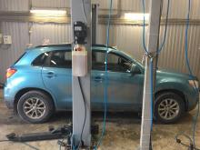 Installing a set of spacers to increase the ground clearance Mitsubishi ASX Lift Kits (leveling kits and coil spring spacer\strut spacer)