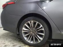 Installing a set of spacers to increase the ground clearance Hyundai Genesis Lift Kits (leveling kits and coil spring spacer\strut spacer)