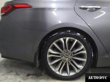 Installing a set of spacers to increase the ground clearance Hyundai Genesis Lift Kits (leveling kits and coil spring spacer\strut spacer)