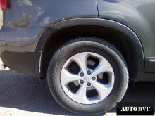 Installing a set of spacers to increase the ground clearance Kia Sorento II Lift Kits (leveling kits and coil spring spacer\strut spacer)