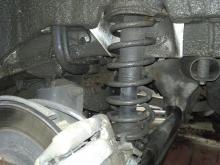 Installing a set of spacers to increase the ground clearance Mitsubishi Outlander III Lift Kits (leveling kits and coil spacer\strut spacer) 