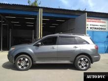 Installing a set of spacers to increase the ground clearance Acura MDX 2008 Lift Kits (leveling kits and coil spacer\strut spacer)