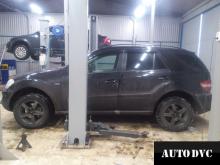 Installing a set of spacers to increase the ground clearance Mercedes ML Lift Kits (leveling kits and coil spring spacer\strut spacer)