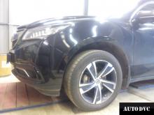 Installing a set of spacers to increase the ground clearance Acura MDX Lift Kits (leveling kits and coil spring spacer\strut spacer)