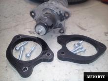 Installing a set of spacers to increase the ground clearance Acura MDX Lift Kits (leveling kits and coil spring spacer\strut spacer)