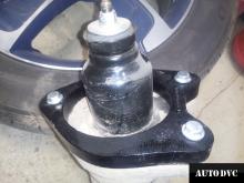 Installing a set of spacers to increase the ground clearance Acura MDX Lift Kits (leveling kits and coil spring spacer\strut spacer)
