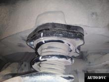 Installing a set of spacers to increase the ground clearance Acura MDX Lift Kits (leveling kits and coil spring spacer\strut spacer)