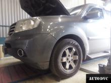 Installing a set of spacers to increase the ground clearance Honda Pilot Kits (leveling kits and coil spacer\strut spacer)