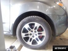 Installing a set of spacers to increase the ground clearance Acura MDX 2008 Lift Kits (leveling kits and coil spacer\strut spacer)