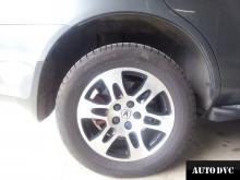 Installing a set of spacers to increase the ground clearance Acura MDX 2008 Lift Kits (leveling kits and coil spacer\strut spacer)