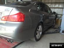 Installing a set of spacers to increase the ground clearance Infiniti M35 Lift Kits (leveling kits and coil spring spacer\strut spacer)