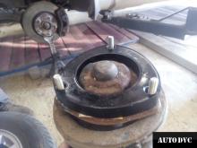 Installing a set of spacers to increase the ground clearance Kia Carens Kits (leveling kits and coil spacer\strut spacer)