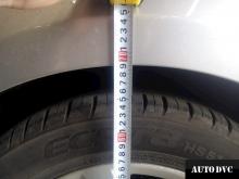 Installing a set of spacers to increase the ground clearance  Kia Optima III Lift Kits (leveling kits and coil spring spacer\strut spacer)