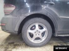 Installing a set of spacers to increase the ground clearance  Mercedes-Benz ML350 (W164) Lift Kits (leveling kits and coil spring spacer\strut spacer)