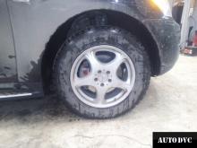 Installing a set of spacers to increase the ground clearance  Mercedes-Benz ML350 (W164) Lift Kits (leveling kits and coil spring spacer\strut spacer)