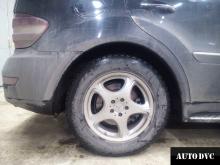 Installing a set of spacers to increase the ground clearance  Mercedes-Benz ML350 (W164) Lift Kits (leveling kits and coil spring spacer\strut spacer)
