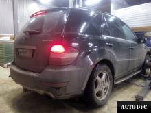 Installing a set of spacers to increase the ground clearance  Mercedes-Benz ML350 (W164) Lift Kits (leveling kits and coil spring spacer\strut spacer)