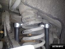 Installing a set of spacers to increase the ground clearance  Mercedes-Benz ML350 (W164) Lift Kits (leveling kits and coil spring spacer\strut spacer)