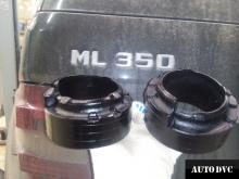 Installing a set of spacers to increase the ground clearance  Mercedes-Benz ML350 (W164) Lift Kits (leveling kits and coil spring spacer\strut spacer)