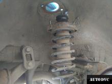 Installing a set of spacers to increase the ground clearance Mitsubishi Carisma Lift Kits (leveling kits and coil spacer\strut spacer)
