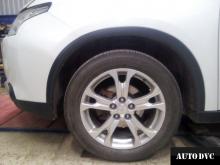 Installing a set of spacers to increase the ground clearance Mitsubishi Outlander III Lift Kits (leveling kits and coil spacer\strut spacer) 