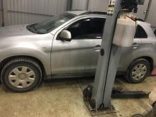 Installing a set of spacers to increase the ground clearance Mitsubishi ASX Lift Kits (leveling kits and coil spring spacer\strut spacer)