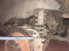 Installing a set of spacers to increase the ground clearance Mitsubishi ASX Lift Kits (leveling kits and coil spring spacer\strut spacer)
