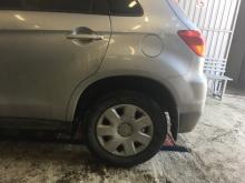Installing a set of spacers to increase the ground clearance Mitsubishi ASX Lift Kits (leveling kits and coil spring spacer\strut spacer)