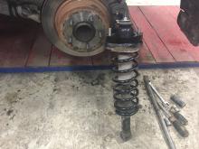 Installing a set of spacers to increase the ground clearance Mitsubishi ASX Lift Kits (leveling kits and coil spring spacer\strut spacer)