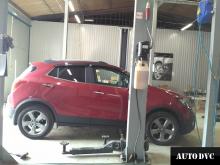 Installing a set of spacers to increase the ground clearance Opel Mokka Lift Kits (leveling kits and coil spring spacer\strut spacer)