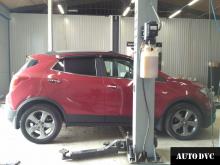 Installing a set of spacers to increase the ground clearance Opel Mokka Lift Kits (leveling kits and coil spring spacer\strut spacer)