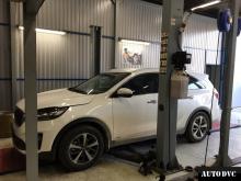 Installing a set of spacers to increase the ground clearance Kia Sorento III Prime Restyle Lift Kits (leveling kits and coil spring spacer\strut spacer)