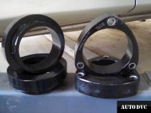 Installing a set of spacers to increase the ground clearance Toyota Estima II Lift Kits (leveling kits and coil spacer\strut spacer)