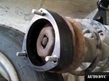 Installing a set of spacers to increase the ground clearance Toyota Estima II Lift Kits (leveling kits and coil spacer\strut spacer)
