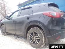 Installing a set of spacers to increase the ground clearance Mazda CX-5 Lift Kits (leveling kits and coil spring spacer\strut spacer)