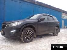 Installing a set of spacers to increase the ground clearance Mazda CX-5 Lift Kits (leveling kits and coil spring spacer\strut spacer)