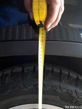 Installing a set of spacers to increase the ground clearance Nissan X-Trail II Lift Kits (leveling kits and coil spring spacer\strut spacer)
