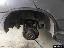 Installing a set of spacers to increase the ground clearance BMW X5 I (E53) Restyle Lift Kits (leveling kits and coil spring spacer\strut spacer)
