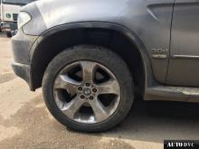 Installing a set of spacers to increase the ground clearance BMW X5 I (E53) Restyle Lift Kits (leveling kits and coil spring spacer\strut spacer)
