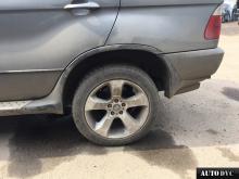 Installing a set of spacers to increase the ground clearance BMW X5 I (E53) Restyle Lift Kits (leveling kits and coil spring spacer\strut spacer)