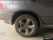 Installing a set of spacers to increase the ground clearance BMW X5 I (E53) Restyle Lift Kits (leveling kits and coil spring spacer\strut spacer)