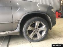 Installing a set of spacers to increase the ground clearance BMW X5 I (E53) Restyle Lift Kits (leveling kits and coil spring spacer\strut spacer)