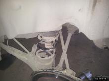 Installing a set of spacers to increase the ground clearance Chery Tiggo (T11) Lift Kits (leveling kits and coil spring spacer\strut spacer)