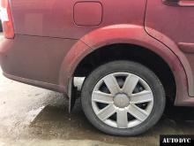 Installing a set of spacers to increase the ground clearance Chevrolet Lacetti Lift Kits (leveling kits and coil spring spacer\strut spacer)
